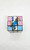 Smurfs Rubiks Cube, image of a 3x3 Rubik's Cube featuring Smurf characters with colorful faces and Smurf artwork on the sides.