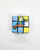 Smurfs Rubik's Cube, a colorful 3x3 puzzle cube featuring images of Smurfs characters and their vehicle from the animated series.
