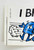 Pac-Man Vintage Midway I Brake For Pac-Man Bumper Sticker, cartoon-style blue Pac-Man character with a cloud of smoke or dust behind it, in motion.
