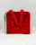 Disney Vintage 1985 Disney Babies Out & Around Tote, red fabric tote bag with matching red handles and white trim.