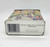 Hershey's Village Series Canister #2 School House, decorative metal tin with colorful illustration of a schoolhouse and children playing outside.