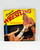 Modern Publishing Ringside Wrestling The Champions Picture Book, vintage wrestling magazine cover featuring wrestlers in a match, bright yellow background, and action shot of wrestlers in a ring.