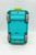 Scooby-Doo The Mystery Machine Playset, view of the underside of the toy featuring its blue and yellow colorful design, gray wheels, and character branding.