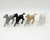 Unknown Vintage Plastic Toy Horses, five miniature plastic toy horses in various colors including white, black, beige, and off-white, arranged in a line on a white background.