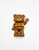 M&M's Plastic Bear Magnet, cute brown bear figurine with M&M's branding on its shirt waving hand.