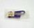 Garfield Vintage 1978 Garfield Plastic Lock Cereal Premium, purple plastic Garfield character lock enclosed in clear plastic packaging.