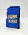 Kenner M.A.S.K. Boulder Hill Playset - Jail Cell/ Computer Terminal, blue plastic toy with detailed graphic stickers of machinery, gauges, and control panels, representing a jail cell and computer terminal from the playset.