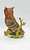 Woolworth Vintage 8-inch Fine Porcelain Owl Hand Painted Bisque Finish, detailed ceramic bird figurine with textured feathers, perched on a branch with a twisted trunk, designed for collector and home decor.