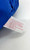 MARVIN Vintage 1982 Marvin Comics Marvin Stuffed Doll, close-up of the stuffed doll's tag and part of its blue fabric surface.
