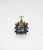 Transformers 1985 G1 Insecticons Bombshell Action Figure, toy robot in insect form with black, purple, yellow, and gold colors, viewed from above.