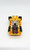 Transformers 1986 G1 Stunticons Drag Strip Action Figure, front view of the toy in vehicle mode showing yellow, black, and purple detail with wheels.
