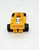 Transformers 1986 G1 Stunticons Drag Strip Action Figure, front view showing yellow vehicle with black wheels and detailed interior