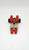 Transformers 1987 G1 Clones Fastlane Action Figure, red and beige toy vehicle with black wheels and detailed robot features.