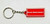 Budweiser Enjoy Responsibly Rubber Keychain, red rectangular rubber keychain with white border and white text reading Enjoy Responsibly connected to a metal keyring and chain.