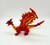 SDE Shantou Orange Red Yellow Winged Dragon PVC Toy Figure, detailed dragon toy with vibrant orange, red, and yellow colors, featuring large wings and fierce facial expression.