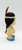 Unbranded Vintage 6" Native American Girl Doll Made in Japan, side view of handcrafted doll with black hair, traditional dress, and feather headdress.