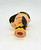 Peanuts Vintage 1950 Charlie Brown Finger Puppet, a small collectible finger puppet depicting Charlie Brown with a yellow shirt and black zigzag pattern, with green hair and facial features, designed for display or play.