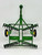 John Deere ERTL John Deere Disc, a 1:16 scale model of a farming disc implement with green frame, black and yellow wheels, and detailed tines, isolated on a white background.