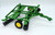 John Deere ERTL John Deere Disc, a 1:16 scale model farm equipment with a green frame, black wheels, and yellow accents used for agricultural miniature display and collection.