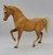 BREYER Vintage BREYER Palomino Arabian Stallion, a detailed collectible model horse with a golden coat, white mane and tail, captured in a dynamic walking pose.