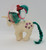 My Little Pony 1984 Gusty, collectible toy pony with colorful mane and tail, cream body with purple star-shaped glitter designs, and a horn on its head.