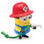 Despicable Me 2 Minion Fireman Action Figure, toy minion character wearing a red fire helmet with the number 15, holding a green fire hose and water spray nozzle, dressed in blue overalls with a yellow body and large goggles.