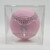 MLB Baltimore Orioles Camden Yards Exclusive Pink Baseball, a pink baseball with gray stitching in a clear display case.