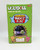 Schylling UGLYDOLL Super Awesome Rocket Ride Wind-up Tin Toy, colorful green packaging featuring a cartoon alien and pink bunny characters, with a clear window showing the wind-up rocket toy inside.