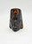 Unknown Mayan/Aztec Polished 3-inch Bust Statue, a carved sculpture of a face with detailed facial features and a glossy black and brown marbled finish.