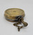 Unknown Vintage Small Brass Oil Can, a small, round antique brass oil can with a spout and chain, showing signs of age and patina.