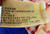 Applause Raggedy Ann and Raggedy Andy Dolls, fabric tag showing brand and manufacturing details.
