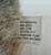 Gibson Greetings 1996 Patriotic Elephant Stuffed Animal, close-up of the fabric tag with product details and material information.