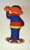 Muppet's Vintage Sesame Street Ernie Pillow, colorful plush pillow featuring Ernie from Sesame Street holding a pumpkin.