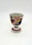 Unknown Vintage Geisha Girl Egg Cup Made in Japan, decorative ceramic egg cup with hand-painted geisha figures and traditional Japanese scenery.