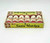 1974 Dan-Dee 6 pack of Santa Matches that are tubes with Santa on them.  The Santa face features the big guy with a jolly smile. Top side view