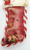 Unknown Vintage Filled Christmas Stocking With Celluloid Tiger Toy, red mesh stocking with vintage holiday design, including small plastic toys and a tiger figurine inside.