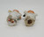 Bonzo Vintage Bonzo Gold Paws Dog Salt & Pepper Shakers, made in Japan, featuring white ceramic dogs with gold accents and paw print details.