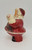 Unknown Vintage 9-inch Paper Mache Santa Claus Figure With Glitter, vintage Santa figurine with red, white, and black paint, showing signs of wear and age.