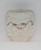 Bland Charnas Co., Inc Bland Charnas Halloween Costume Monster Size Small mask, front view showing the white plastic mask with eye holes, nose, and mouth cutouts, and black elastic strap for wearing.