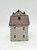 Windy Meadows Pottery Chocolateria Clay House, detailed ceramic model of a multi-story house with a textured brick roof, small windows, and decorative elements.