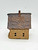 Windy Meadows Pottery School House Clay House, handmade ceramic model of a rustic school house with textured walls and a shingled roof.