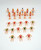Unknown HO Train Scale Figures - 24 Pool Side Toy Figures, miniature plastic figures dressed in red, green, and blue swimsuits, arranged in rows for train set miniatures or model scenery.