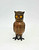 Vintage 3" tall plastic brown owl nodder aka bobblehead. The plastic owl has yellow eyes and his head just moves freely. 