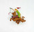 Hallmark Keepsake Ornament 2000 Scooby-Doo, a festive Christmas ornament depicting Scooby-Doo riding a rearing horse while holding a candy cane with Santa hat on his head.