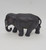 Vintage Celluloid elephant toy figure that stands 2.75 inches high and 5 inches long.  This grey elephant is walking pose with trunk curled up.