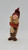 Unbranded Folk Art Pinecone Santa Claus Figure, handcrafted Santa with pinecone body, red hat, red scarf, and holding a broom, decorative Christmas folk art ornament.
