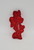 Disney's Minnie Mouse red plastic cookie cutter from Loma Ft. Worth.  The plastic cookie cutter is 4" long and 2" wide with small plastic handle.