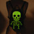 Sleepyville Critters Glow in the Dark Skeleton Backpack, featuring a glowing green skeleton design with a skull and rib cage, shown on a mannequin in a dimly lit setting.
