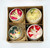 Unknown Vintage Diorama Figural Christmas Tree Ornaments Made in Japan, set of four decorative holiday ornaments featuring angel and reindeer figures inside small metallic containers.
