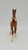 BREYER Breyer Scribbles Painted Horse Foal #985 Traditional Series, a detailed model horse figurine of a foal with brown and white markings, photographed from the back on a plain background.